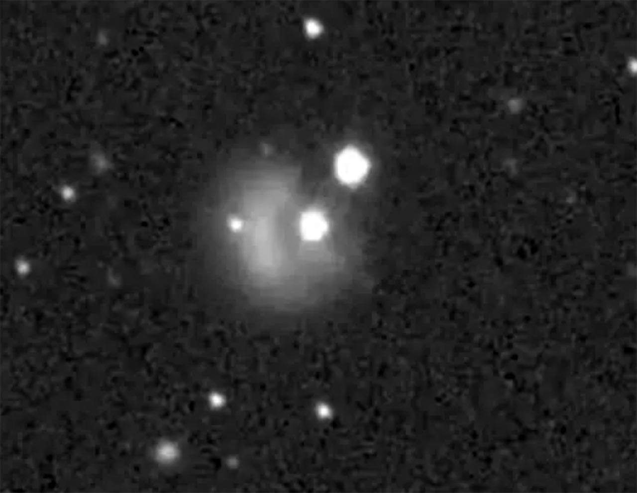 Vista desde un telescopio en Haewai de la nube de materia sale despedida del sistema Didymos tras el impacto de la nave DART / Imagen: EP