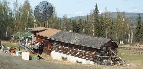 Una vivienda hundiéndose por el deshielo cerca de Fairbanks (Alaska) / Foto: Vladimir Romanovsky