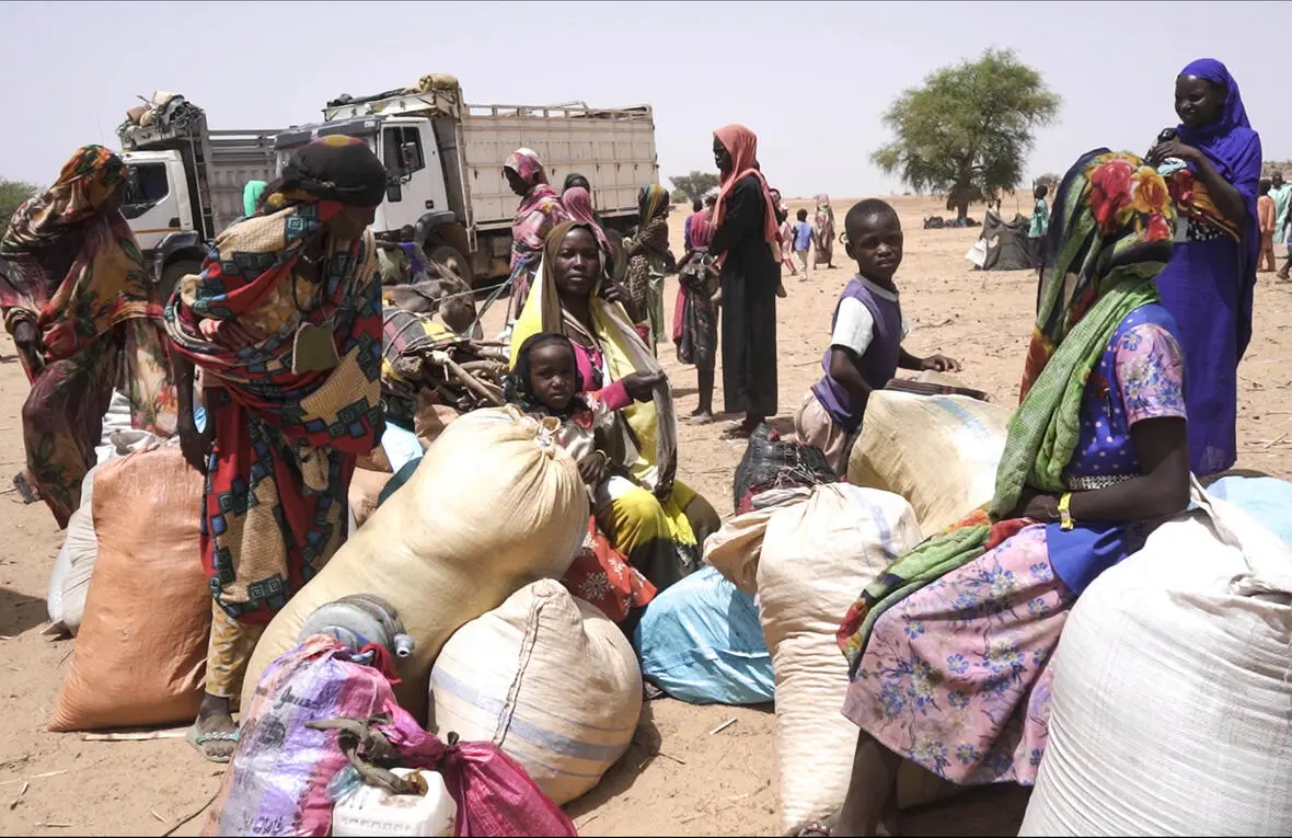 Un grupo de personas refugiadas de Sudán se prepara para trasladarse al campamento de Gaga, a 130 kilómetros de la frontera. Día Mundial del Refugiado / Foto: Wawa Diatta - ACNUR