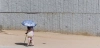 Dos personas se resguardan bajo un paraguas del calor / Foto: EP Dos personas se resguardan bajo un paraguas del calor / Foto: EP