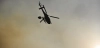 Un helicóptero trabaja en las labores de extinción de incendios forestales / Forto: EP Un helicóptero trabaja en las labores de extinción de incendios forestales / Forto: EP