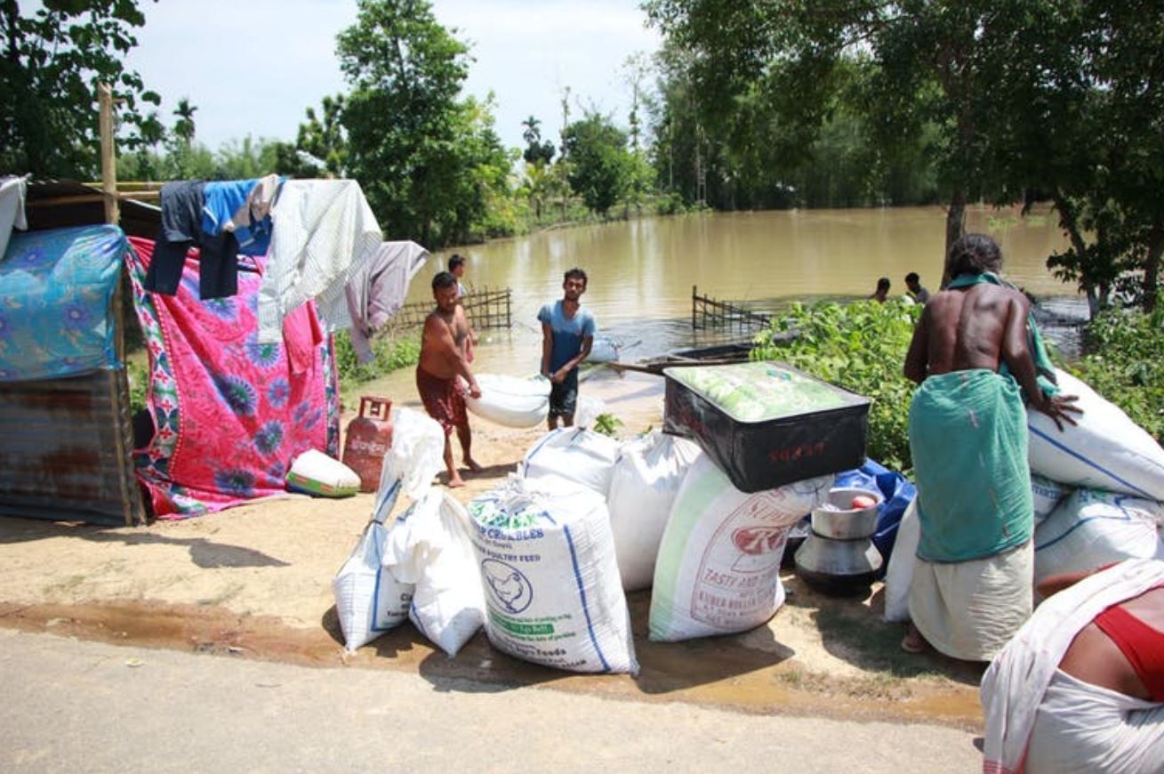 Inundación en una aldea de la India. Migraciones climáticas / Foto: The Conversation