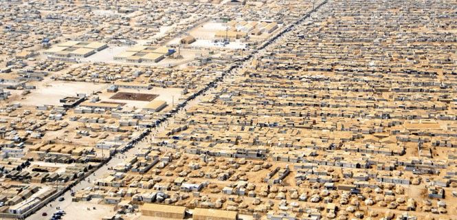 El campo de refugiados de Zaatari en Jordania en julio de 2013. La guerra en Siria reduce a la mitad los recursos hídricos y las tierras de regadío / Foto: Departamento de Estado de EE.UU. - Wikipedia